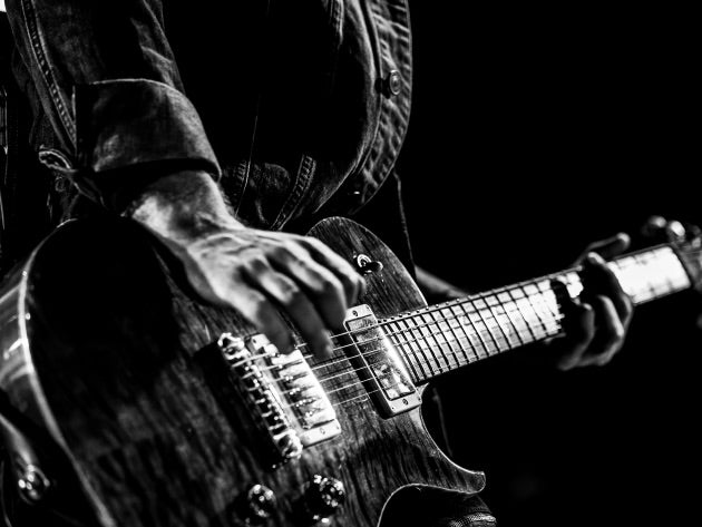 man playing guitar
